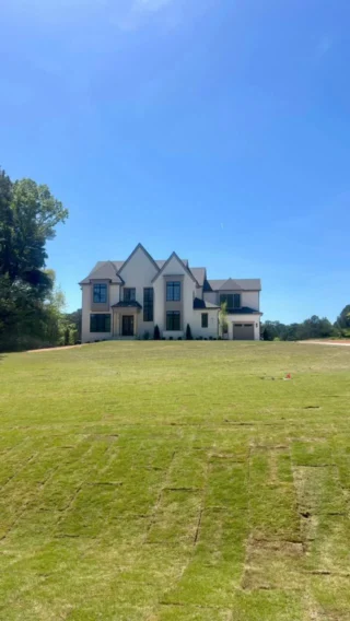 Landscaping goes a long way 🌱⁣
⁣
From bare ground to a finished look—sod makes all the difference.⁣
⁣
#homesteadbuilt #landscapingdesign #luxuryhome #greengrassbluesky #customhomebuilder